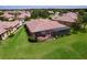Aerial view showcases this home's prime location and screened-in lanai at 5663 Sunset Falls Dr, Apollo Beach, FL 33572