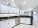 Bright kitchen featuring stainless appliances, plenty of storage and counterspace at 5663 Sunset Falls Dr, Apollo Beach, FL 33572