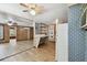 Open layout showing the kitchen and living area with a view of the backyard at 5906 12Th St, Zephyrhills, FL 33542