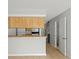 Kitchen featuring a breakfast bar and views to other areas in the home at 6114 Oak Cluster Cir, Tampa, FL 33634
