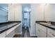 Renovated bathroom features dual vanities, updated fixtures, and tile floors at 6206 92Nd N Pl # 3605, Pinellas Park, FL 33782