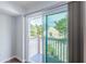 Cozy bedroom with sliding door access to the deck, plus a peaceful outdoor view at 6206 92Nd N Pl # 3605, Pinellas Park, FL 33782