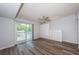 Spacious bedroom with sliding door, new floors, closet and dresser at 6206 92Nd N Pl # 3605, Pinellas Park, FL 33782