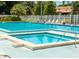 Relaxing community hot tub alongside the pool, perfect for leisure and recreation at 6206 92Nd N Pl # 3605, Pinellas Park, FL 33782
