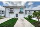Charming townhome boasts a private balcony, garage, and lush green lawn at 6206 92Nd N Pl # 3605, Pinellas Park, FL 33782