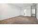 Spacious bedroom with neutral carpet and en-suite bathroom access at 7024 Bradbury Cir, Wesley Chapel, FL 33545