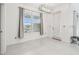 Bright breakfast nook featuring a large window and door at 7024 Bradbury Cir, Wesley Chapel, FL 33545