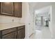 Kitchen with extra counter space leading into breakfast nook at 7024 Bradbury Cir, Wesley Chapel, FL 33545