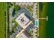 Aerial shot of the property with a pool, waterway, docks and lush landscaping at 7430 Sunshine Skyway S Ln # 602, St Petersburg, FL 33711