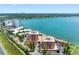 Expansive aerial view of condos overlooking the bay with city views and lush landscaping at 7430 Sunshine Skyway S Ln # 602, St Petersburg, FL 33711