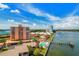 Beautiful aerial of the property, highlighting the proximity to the water, pool and surrounding landscape at 7430 Sunshine Skyway S Ln # 602, St Petersburg, FL 33711