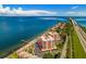Waterfront condo complex featuring pool, docks, parking, mature landscaping and bay views at 7430 Sunshine Skyway S Ln # 602, St Petersburg, FL 33711