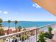Relaxing balcony boasts tropical foliage and an expansive view of the ocean and nearby residential community at 7430 Sunshine Skyway S Ln # 602, St Petersburg, FL 33711