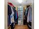 Walk-in closet with ample storage, shelving, and hanging space for an organized wardrobe at 7430 Sunshine Skyway S Ln # 602, St Petersburg, FL 33711