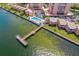 Waterfront condo complex featuring pool, docks, lush landscaping and bay views at 7430 Sunshine Skyway S Ln # 602, St Petersburg, FL 33711