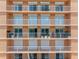 Building exterior with balconies, windows, and railings, providing a glimpse of outdoor living at 7430 Sunshine Skyway S Ln # 602, St Petersburg, FL 33711