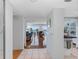 Bright entryway with view of the living room and beautiful waterfront views at 7430 Sunshine Skyway S Ln # 602, St Petersburg, FL 33711