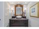 An elegant bathroom featuring a vessel sink, stylish fixtures, and a decorative mirror at 744 53Rd N Ter, St Petersburg, FL 33703