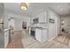 Modern kitchen featuring stainless steel appliances, granite countertops, and ample cabinet space at 744 53Rd N Ter, St Petersburg, FL 33703