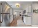 Beautifully updated kitchen with stainless steel appliances, modern lighting, and plenty of counter space at 744 53Rd N Ter, St Petersburg, FL 33703