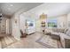 Inviting living room with hardwood floors, modern lighting, and a cozy seating area, ideal for entertaining at 744 53Rd N Ter, St Petersburg, FL 33703