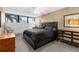 Bedroom with carpet, fan, and tan walls at 80 Rogers St # 2D, Clearwater, FL 33756
