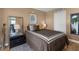 Bedroom with a queen-size bed and neutral decor at 80 Rogers St # 2D, Clearwater, FL 33756