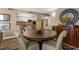 Dining room view to kitchen with breakfast bar at 80 Rogers St # 2D, Clearwater, FL 33756