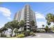 Exterior view of the Prelude 80 condo featuring an attractive entrance and well maintained landscaping at 80 Rogers St # 2D, Clearwater, FL 33756