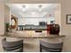 Kitchen pass-through with granite counters to dining area at 80 Rogers St # 2D, Clearwater, FL 33756