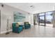 Bright and inviting lobby area featuring comfortable seating, modern decor and views of the surrounding area at 80 Rogers St # 2D, Clearwater, FL 33756