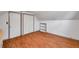 Bedroom features wood floors, vaulted ceiling, closet and a built-in shelving unit at 8074 37Th N Ave, St Petersburg, FL 33710