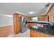 Spacious kitchen with stainless steel appliances, oak cabinets and granite countertops at 8074 37Th N Ave, St Petersburg, FL 33710