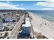 Hotel aerial showcasing beachfront location with street access at 9980 Gulf Blvd # 408, Treasure Island, FL 33706