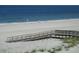 Beautiful beach with wooden boardwalk and ocean views, inviting for relaxing strolls at 9980 Gulf Blvd # 408, Treasure Island, FL 33706