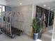 Hallway area with luggage carts, plant in decorative pot, and an ATM at 9980 Gulf Blvd # 408, Treasure Island, FL 33706