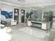 Stylish lobby area featuring sleek furniture, artistic decor, and ample natural light for an inviting atmosphere at 9980 Gulf Blvd # 408, Treasure Island, FL 33706