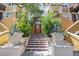Inviting entrance with landscaped stairs leading to the front door at 100 4Th S Ave # 103, St Petersburg, FL 33701