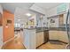 Open-concept kitchen overlooking the living room and featuring modern appliances at 100 4Th S Ave # 103, St Petersburg, FL 33701