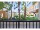View from the patio showcasing lush greenery and well-maintained landscaping at 100 4Th S Ave # 103, St Petersburg, FL 33701