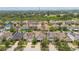 Neighborhood aerial view of multiple single-Gathering homes showcasing well-maintained lawns and community landscaping at 11541 Tangle Branch Ln, Gibsonton, FL 33534