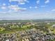 Community aerial view showcasing a sprawling residential area with scenic water views and lush green spaces at 11541 Tangle Branch Ln, Gibsonton, FL 33534
