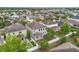 Aerial view of a property featuring a backyard with a patio area and white fence at 11541 Tangle Branch Ln, Gibsonton, FL 33534