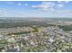 Drone shot showcasing the sprawling community, mature trees, and serene atmosphere of this residential area at 11541 Tangle Branch Ln, Gibsonton, FL 33534