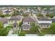 Aerial shot showcasing a backyard with a covered patio and privacy fence at 11541 Tangle Branch Ln, Gibsonton, FL 33534