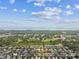 Community aerial showcasing well-planned neighborhood layout near waterway, and lush landscaping at 11541 Tangle Branch Ln, Gibsonton, FL 33534