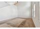 Bright living room with vaulted ceilings, ceiling fan, and large windows at 11541 Tangle Branch Ln, Gibsonton, FL 33534
