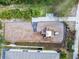 Overhead view of community playground with slides, swings, and seating at 11541 Tangle Branch Ln, Gibsonton, FL 33534