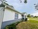 Exterior home view showcasing brick accents and manicured landscaping at 13186 Thrush St, Spring Hill, FL 34609