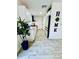 Modern kitchen featuring white cabinetry, sleek appliances, and a stylish design with decorative touches at 13186 Thrush St, Spring Hill, FL 34609